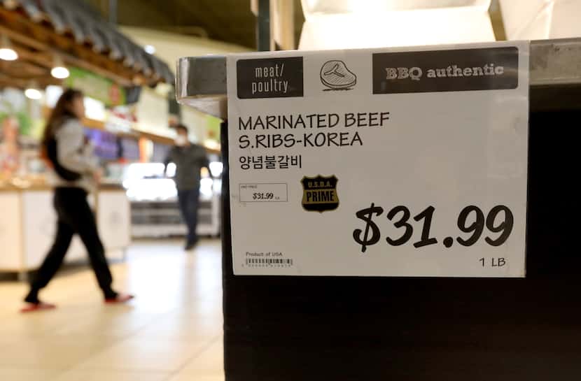 Marinated meat is for sale at H Mart in Carrollton.