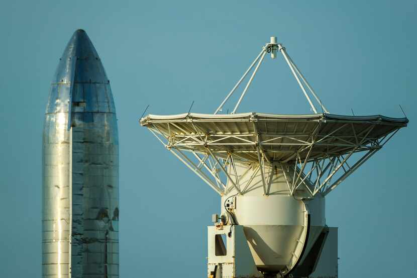 A prototype of the Starship spacecraft is seen with a tracking antenna at the SpaceX Space...