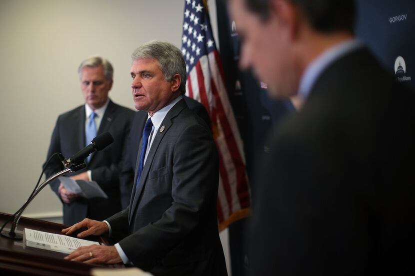 Rep. Michael McCaul  (center), R-Austin, will be part of the informal working group of...