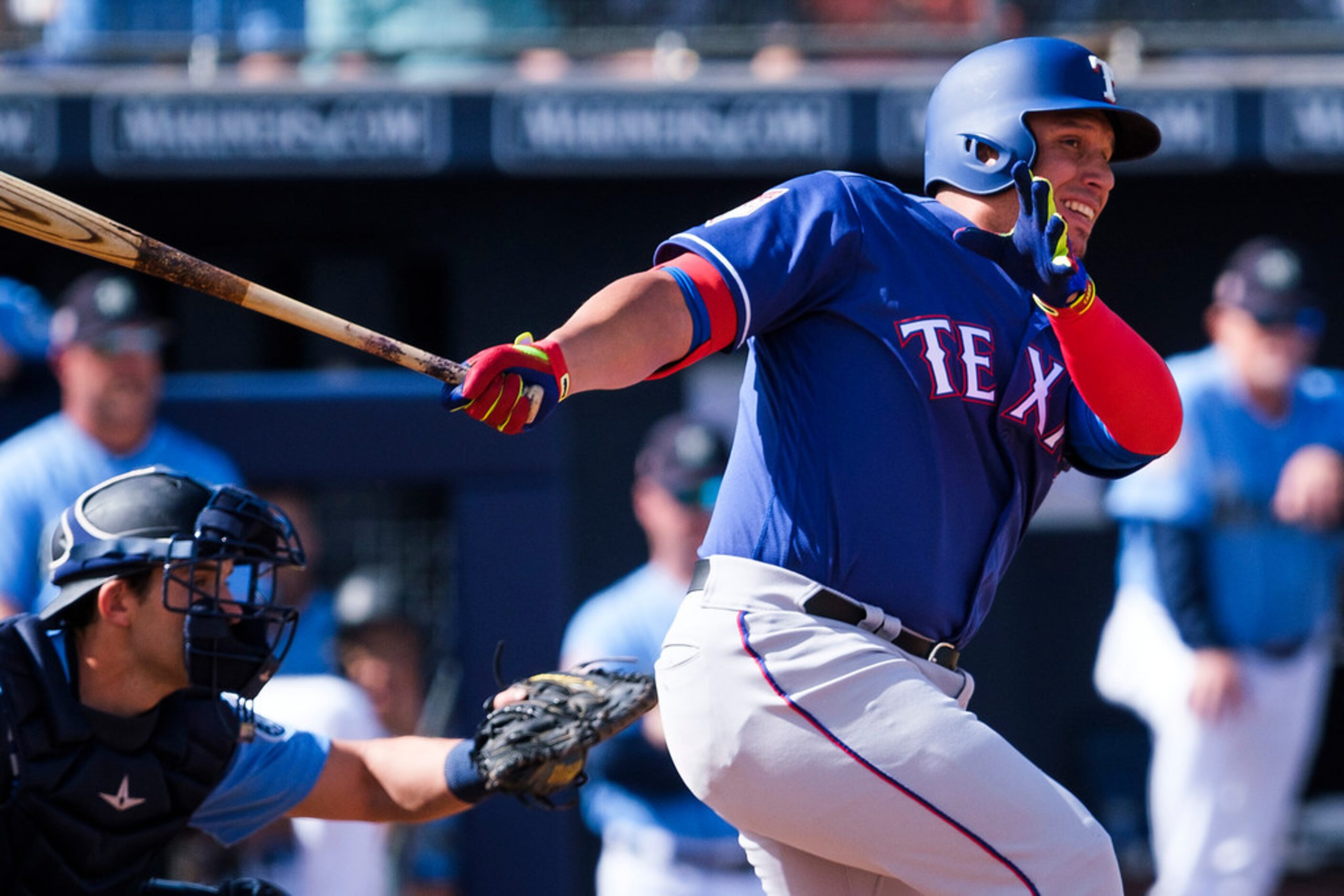 Texas Rangers third baseman Asdrubal Cabrera bats during the fourth inning of spring...