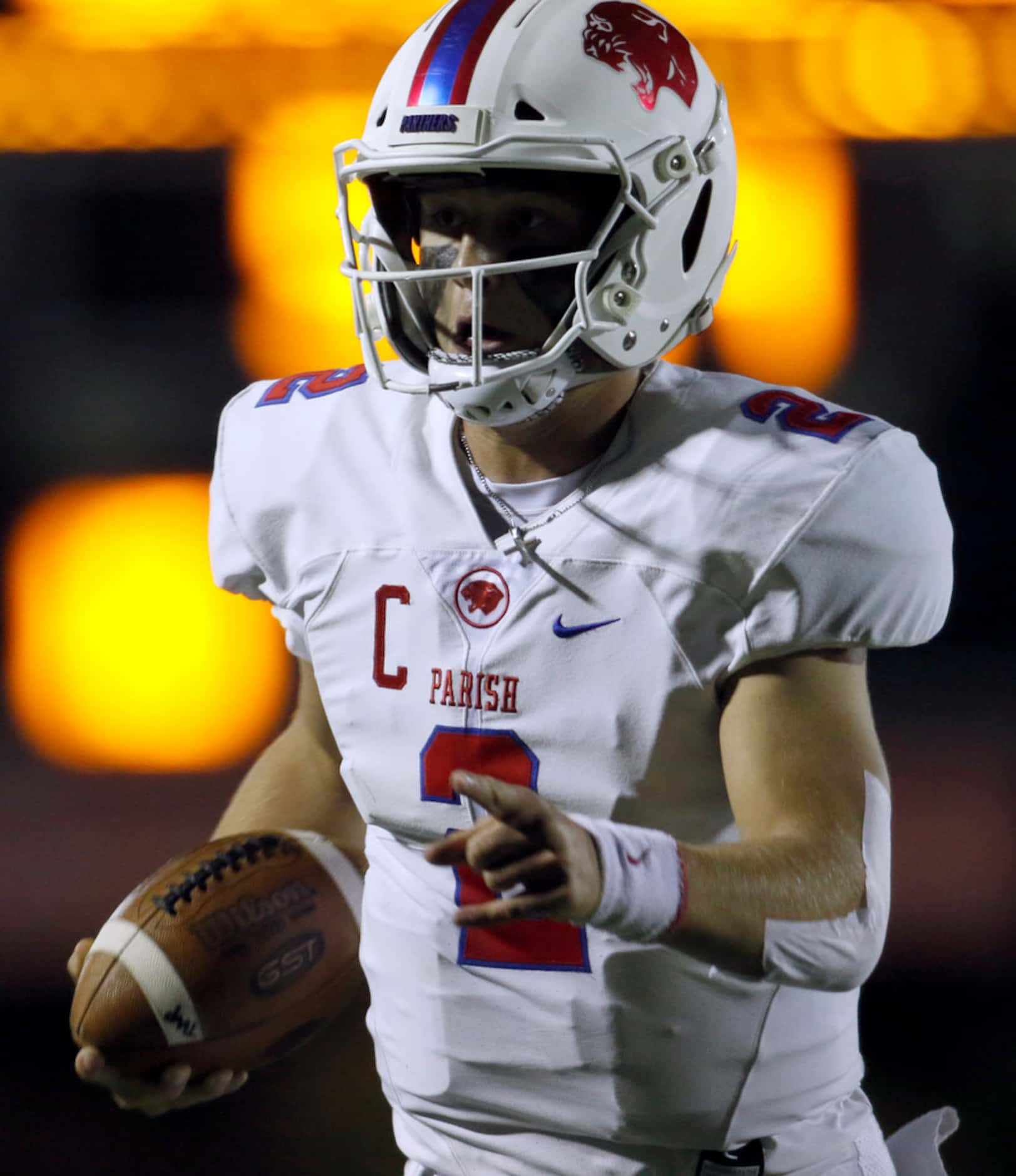 Parish Episcopal quarterback Preston Stone (2) scampers enroute to a long rushing touchdown...