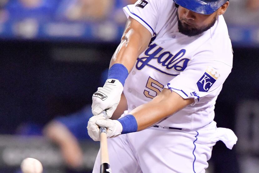 The Kansas City Royals' Melky Cabrera connects on a double in the first inning against the...