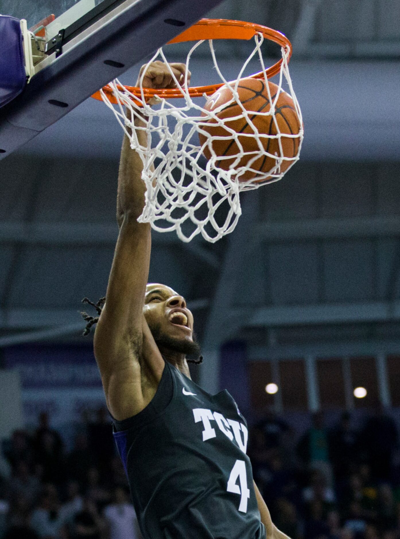 TCU Horned Frogs guard PJ Fuller (4) dunks during the second half of an NCAA mens basketball...