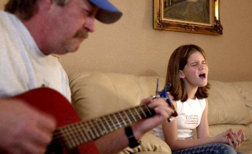 At 11 years old, Maren  Morris (right) practices her country songs with accompanist Randy...