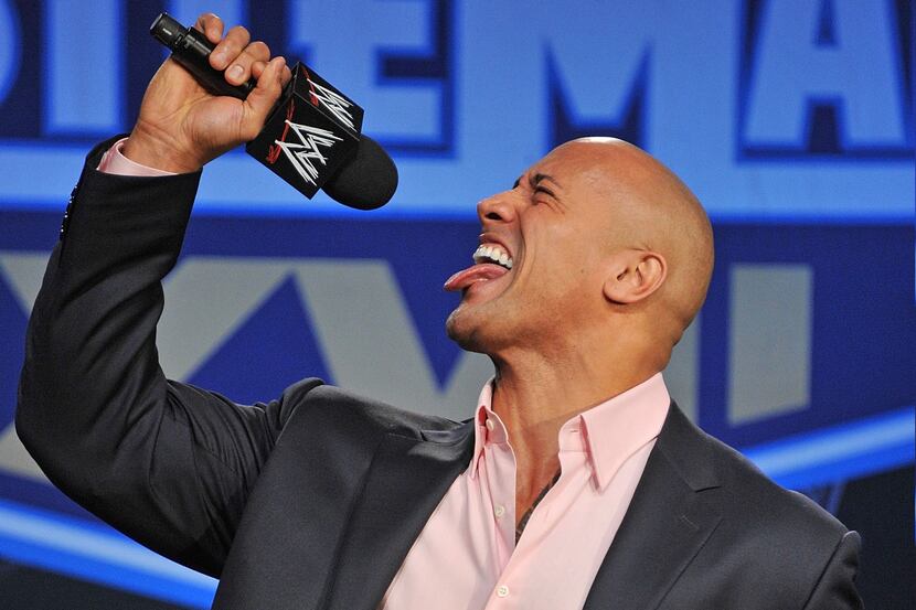 Dwayne "The Rock" Johnson attends the WrestleMania XXVII press conference at Hard Rock Cafe...