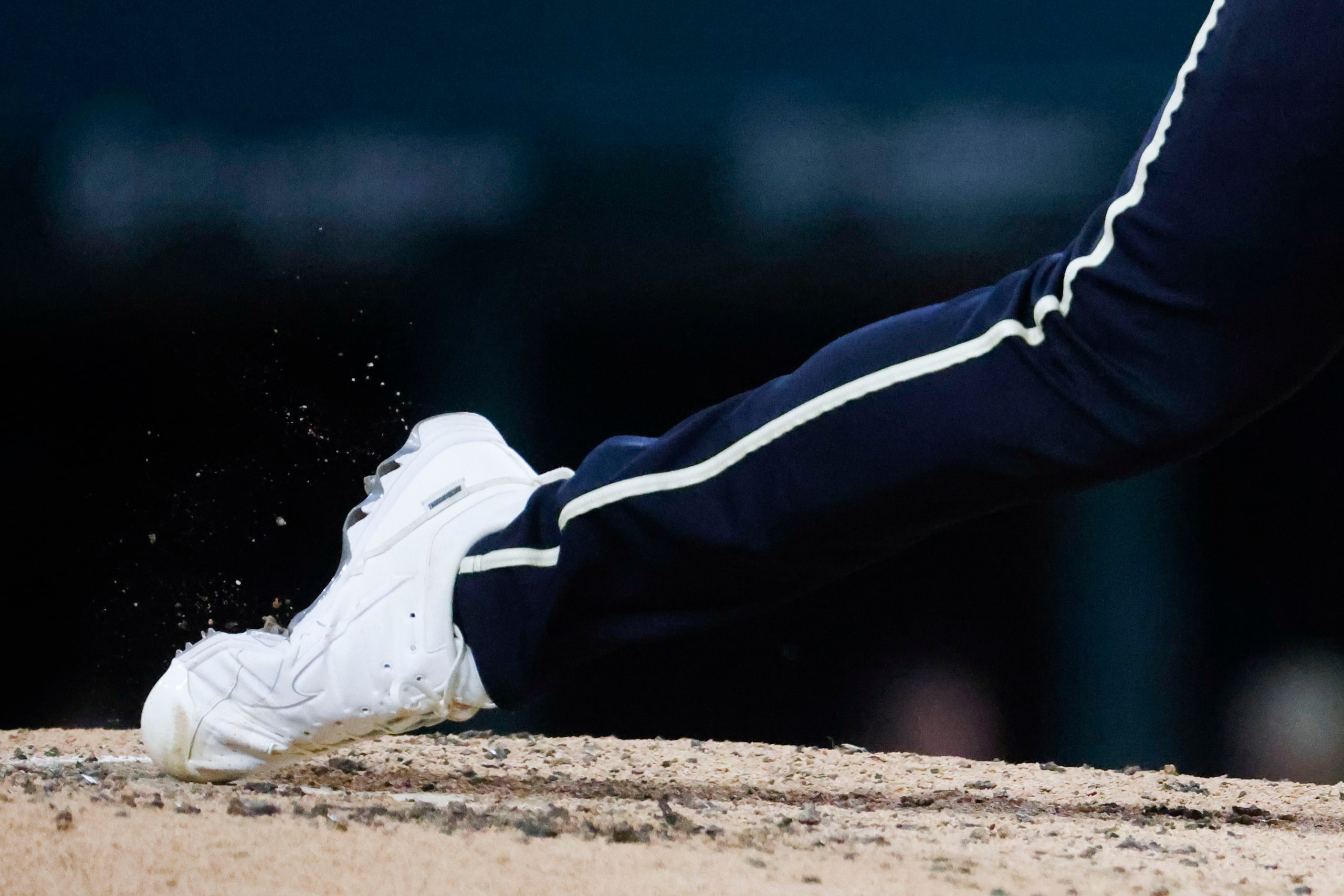 Texas Rangers starting pitcher Jon Gray throws during the first inning of a baseball game...