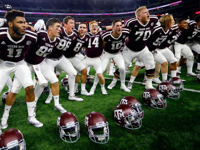 Texas A&M Aggies quarterback Trevor Knight (8) joined his tufter defeating Arkansas...