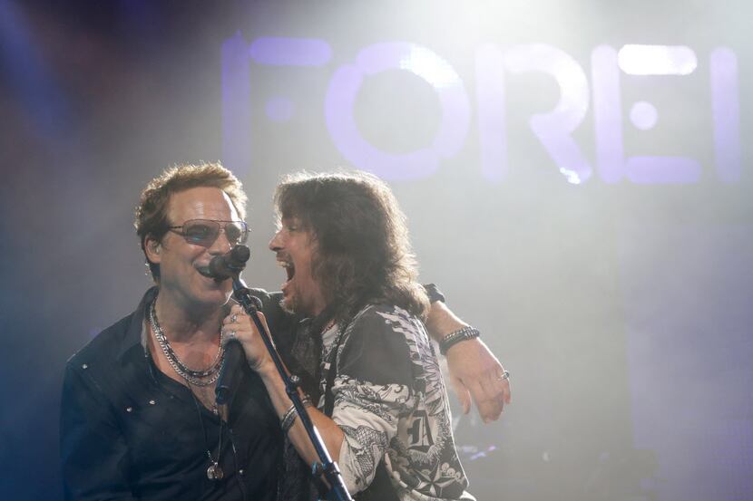 Foreigner's Tom Gimbel (left) and Kelly Hansen (right) perform at Verizon Theatre in Grand...