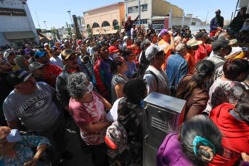 At the Texas-Mexico border, migrants -- most of them from Venezuela -- congregated in front...