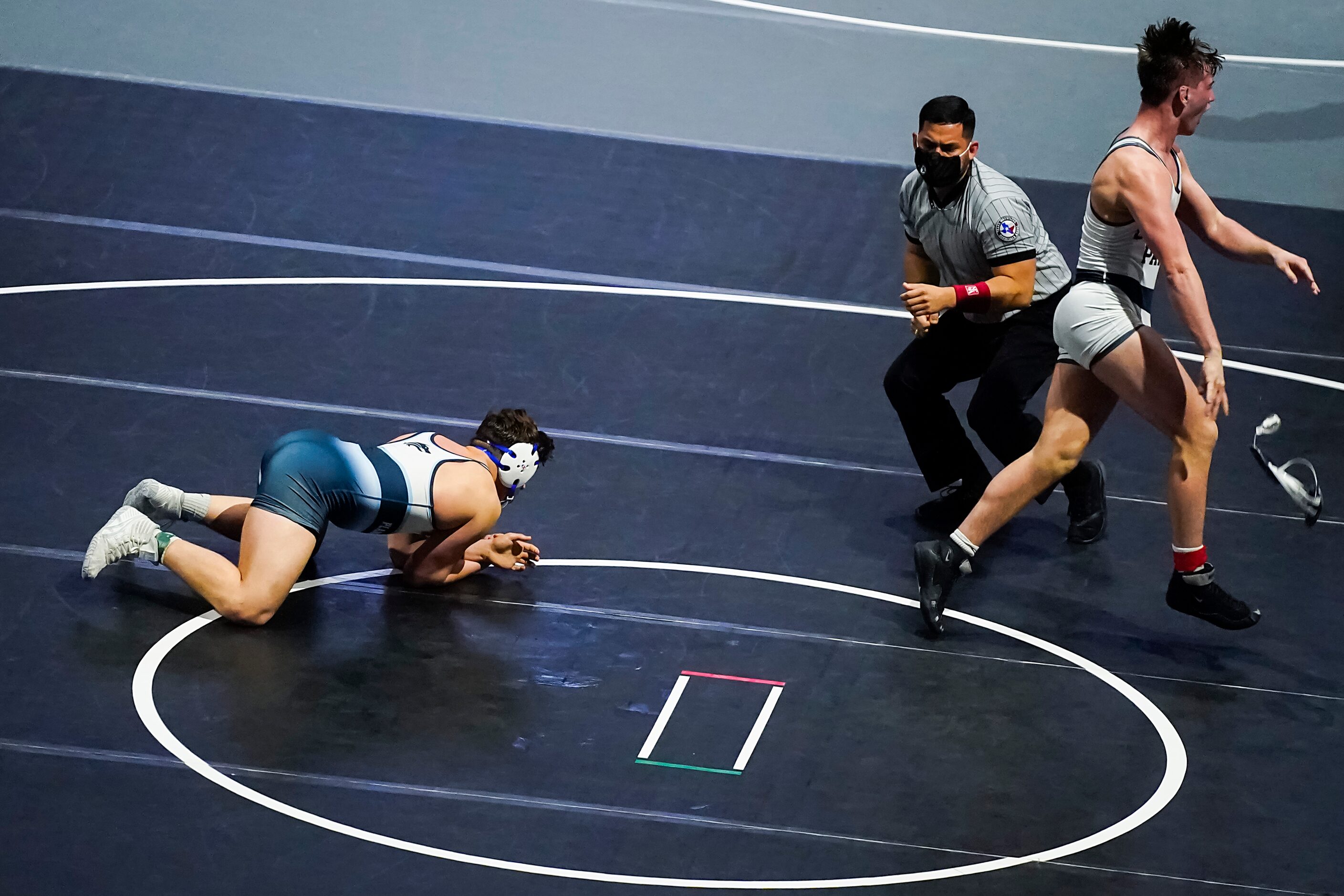 Jonathan Wertz of Conroe Woodlands College Park celebrates after defeating Farid Mobarak of...