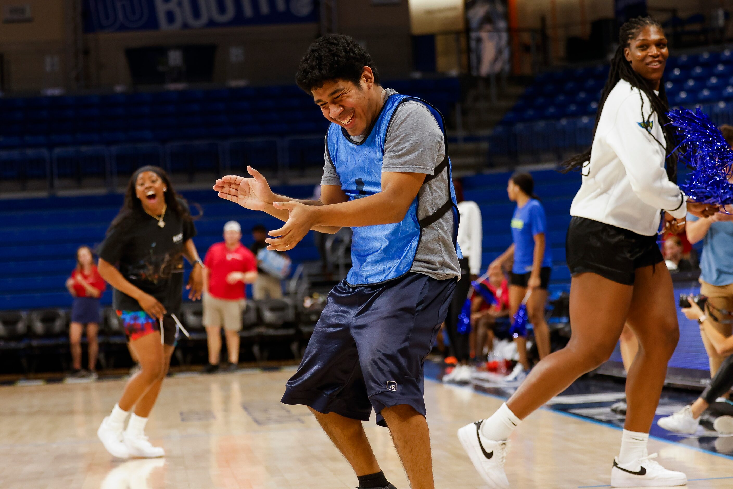 Team Arike’s DJ Harbert (6) celebrates making a three-pointer against Team Marina during the...