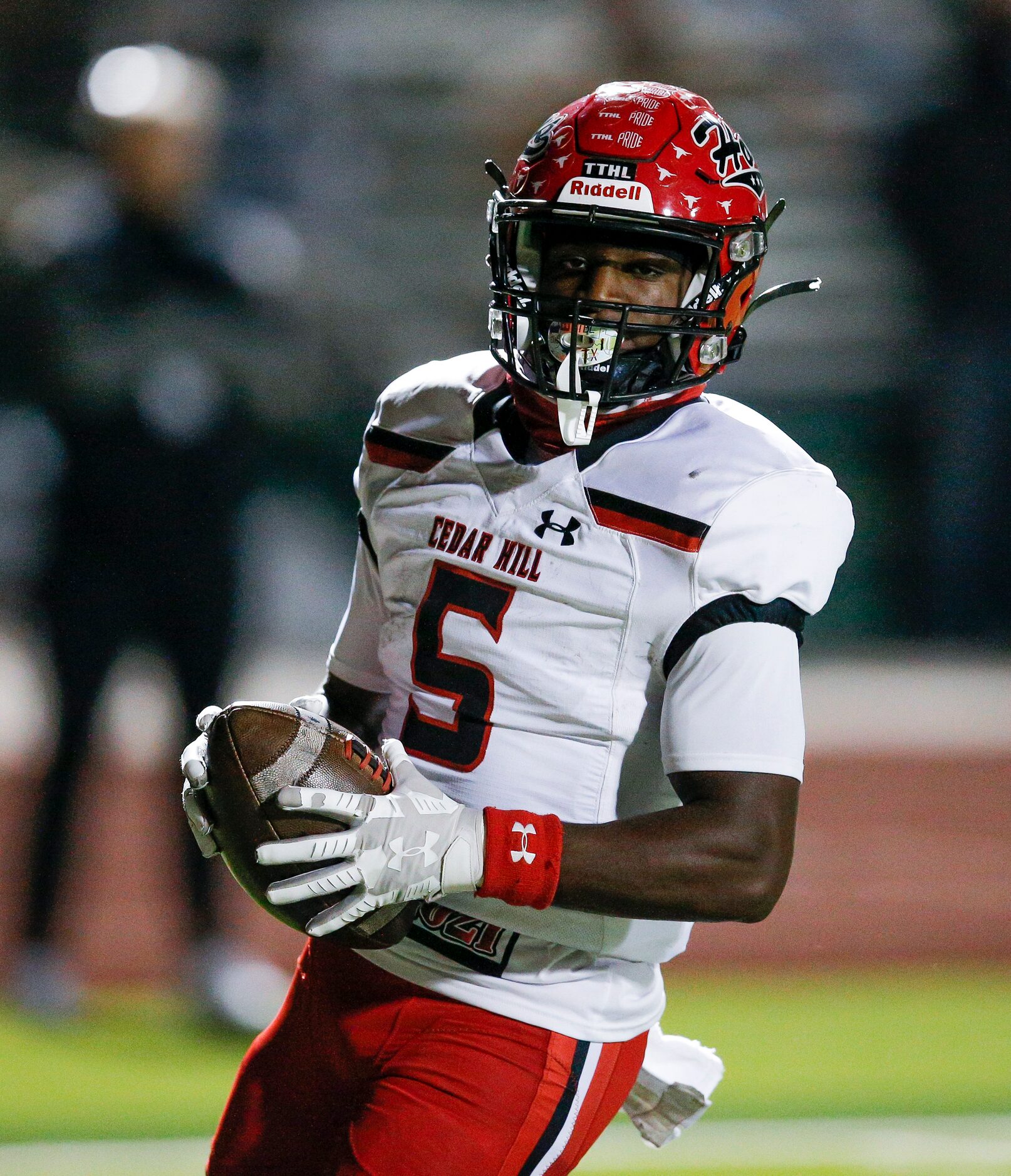 Cedar Hill senior running back Kevin Young Jr. (5) scores a touchdown during the first half...