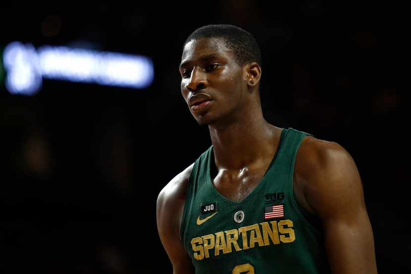 Michigan State forward Jaren Jackson Jr. walks on the court in the first half of an NCAA...