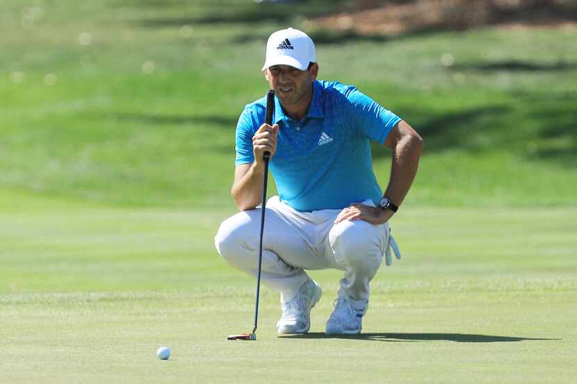 PONTE VEDRA BEACH, FLORIDA - MARCH 12: Sergio Garcia of Spain lines up a putt on the eighth...