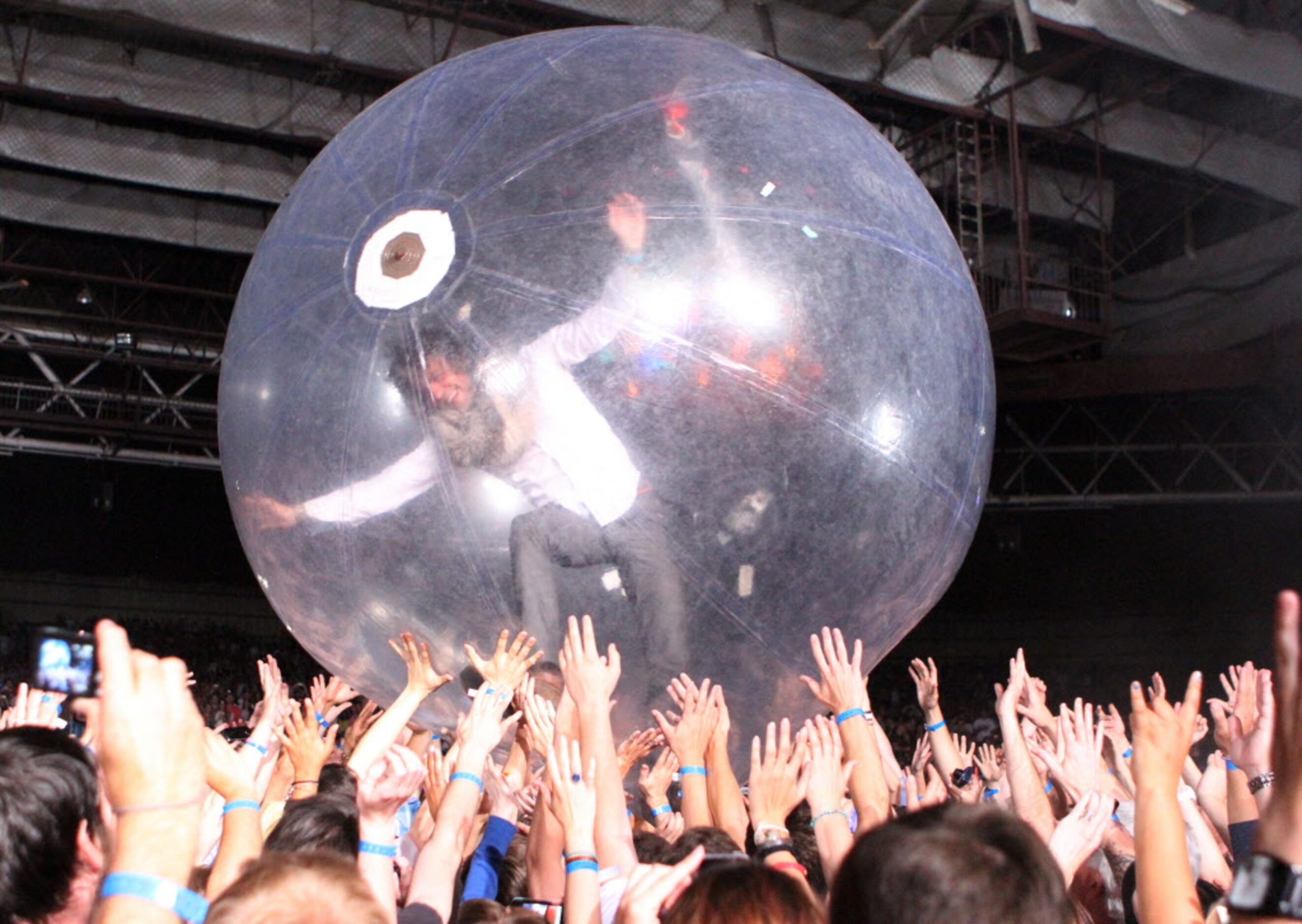 Flaming Lips lead singer Wayne Coyne crowd-surfs in a giant bubble during the KXT Summer Cut...