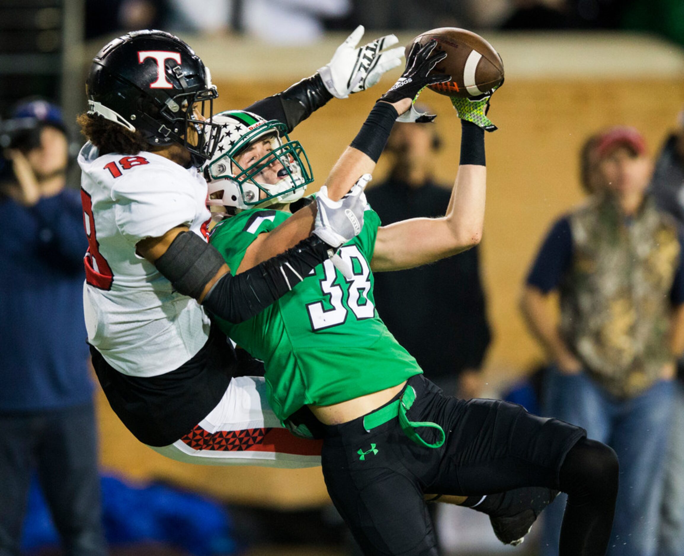 Southlake Carroll defensive back Dylan Thomas (38) can't hold on to a pass intended for...