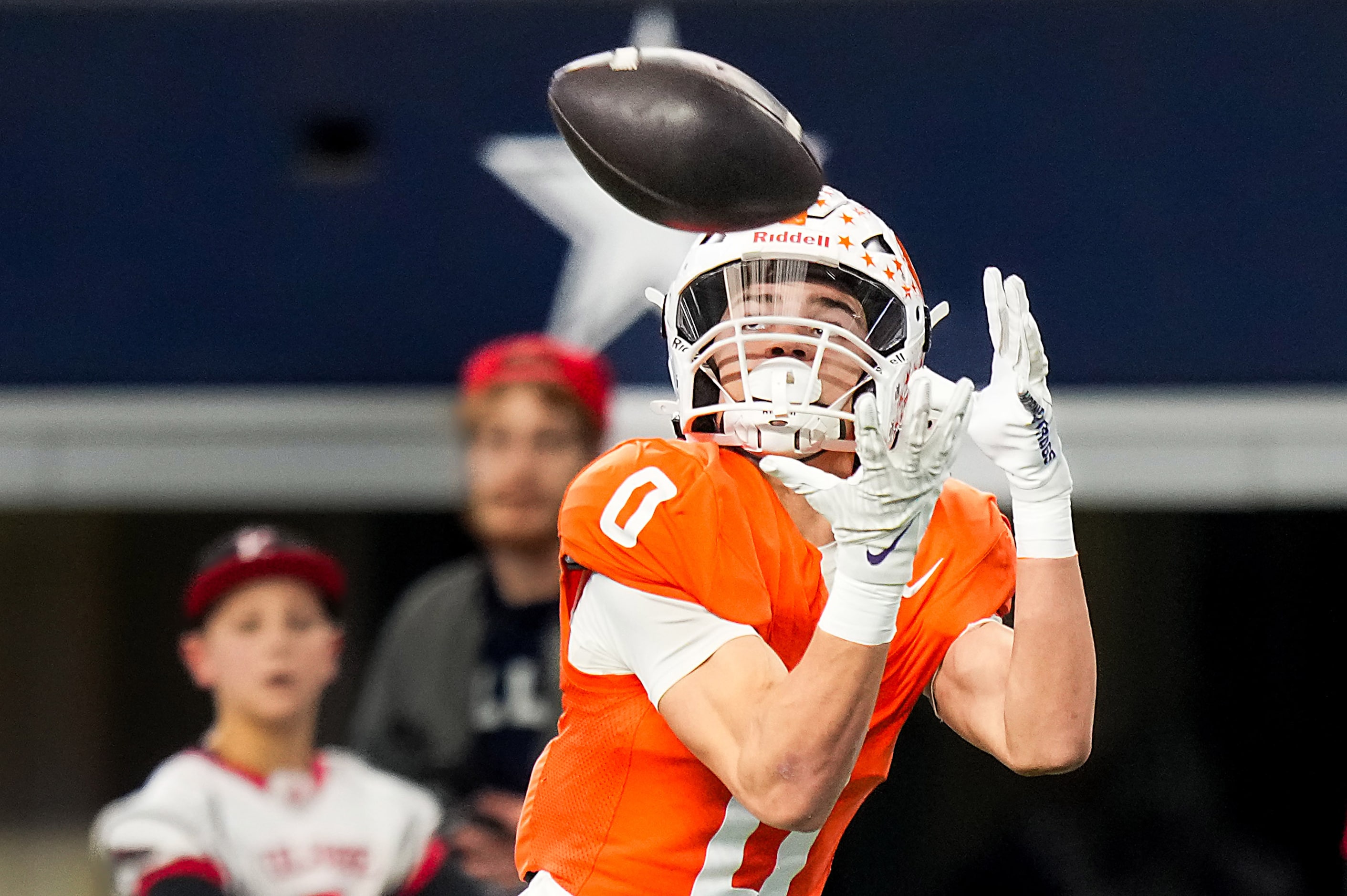 Celina's Ethan Rucker (0) pulls in a 34-yard touchdown pass during the Class 4A Division I...