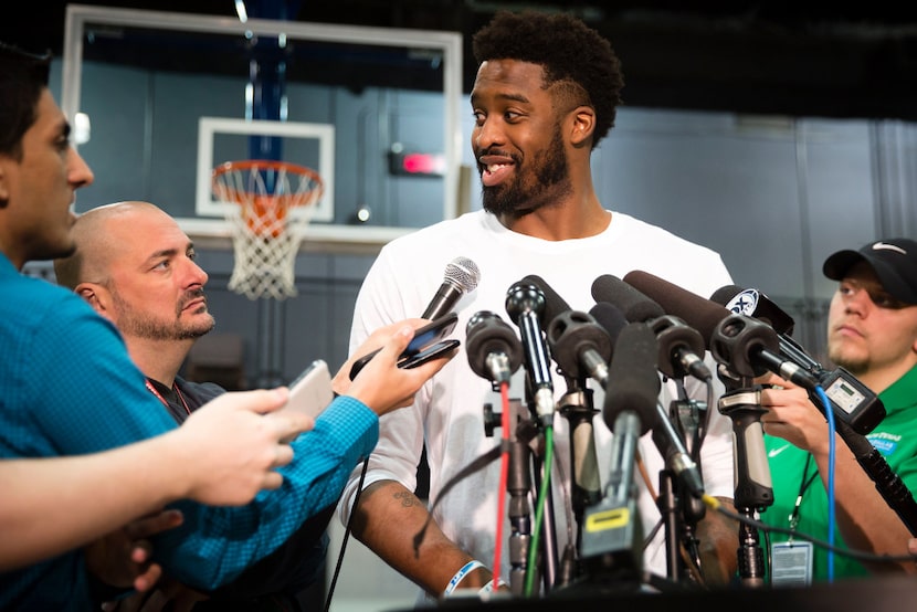 Dallas Mavericks guard Wesley Matthews takes questions as Mavericks players conduct exit...