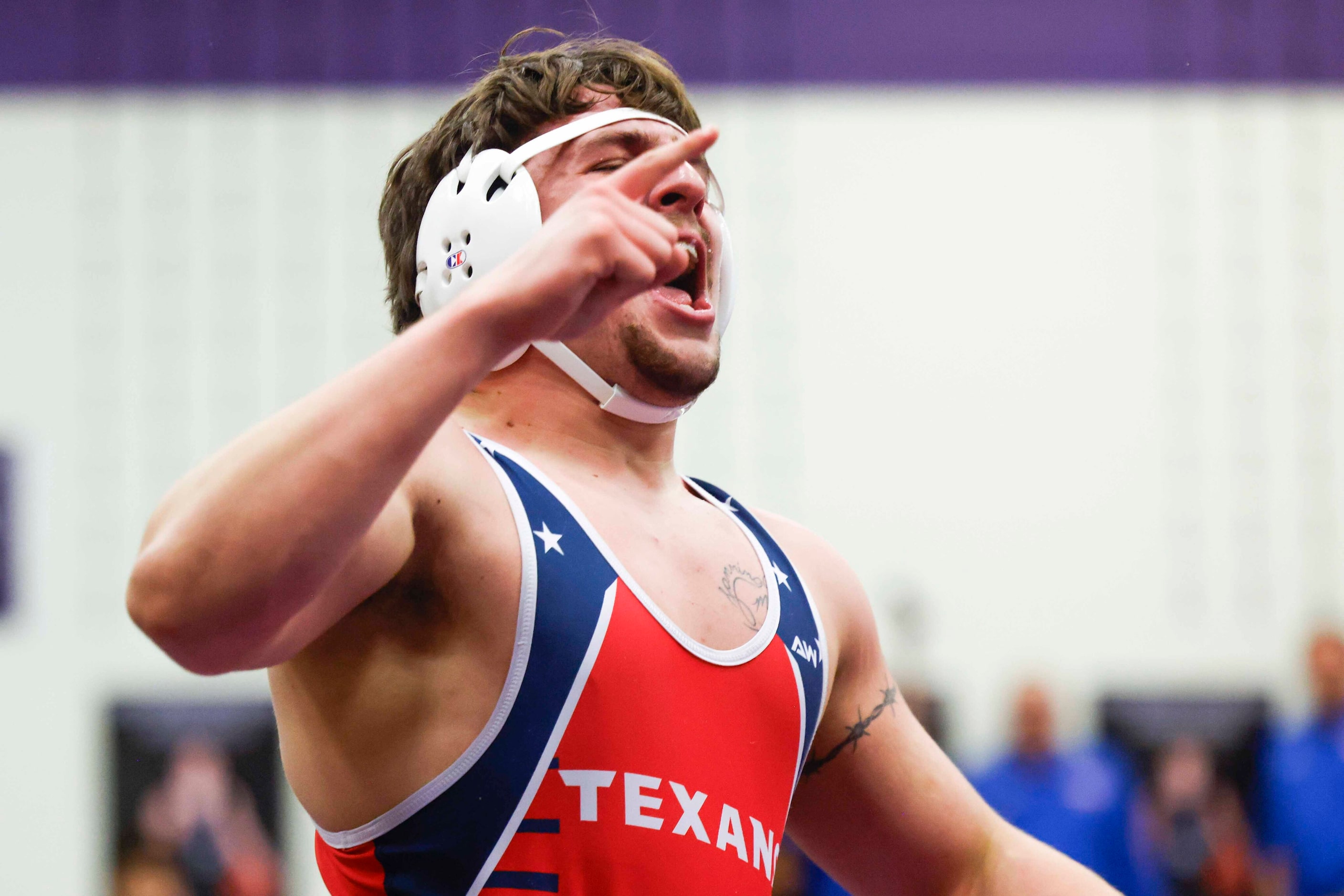 Jaxson Lee of Northwest cheer over his win agianst Jett Hanlin of Frisco Reedy (bottom)...