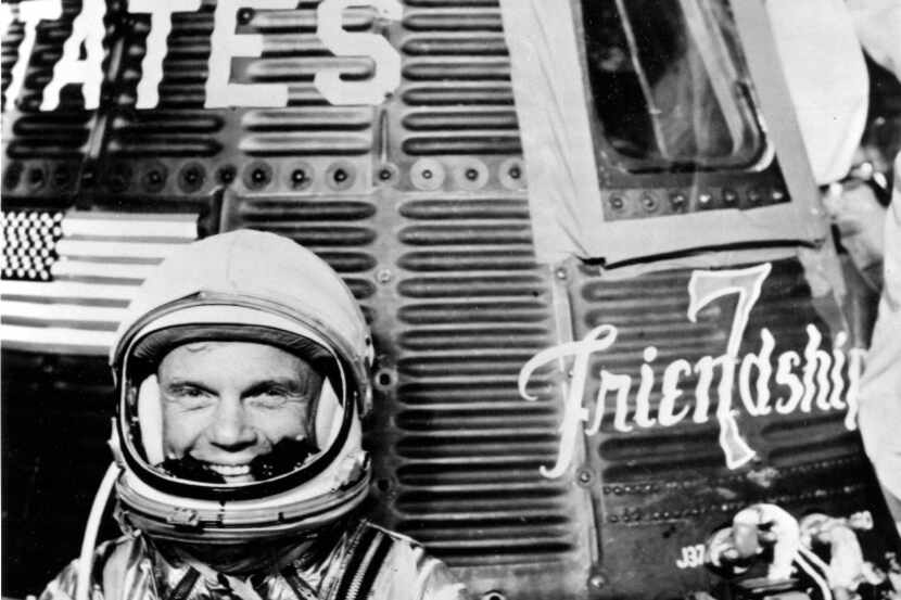 John Glenn with his Mercury space capsule, Friendship 7, in an undated handout photo. Glenn,...
