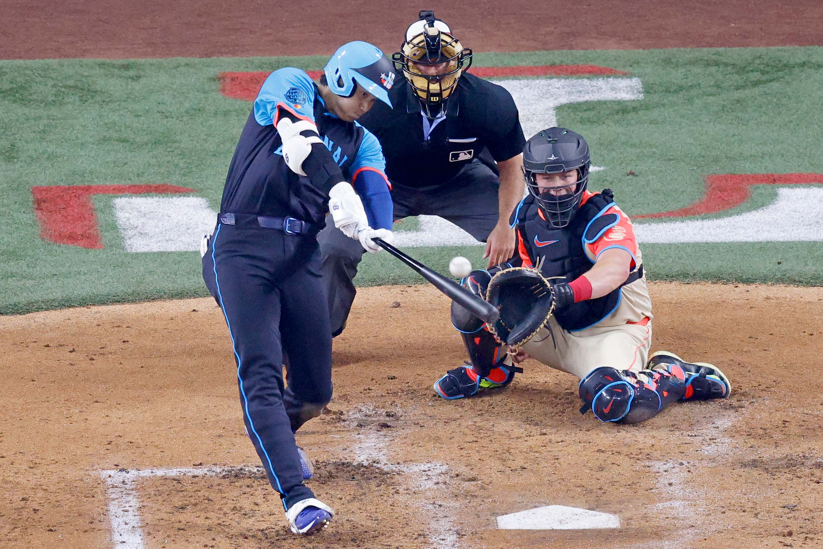 National League designated hitter Shohei Ohtani of Los Angeles Dodgers (17) hits a home run...