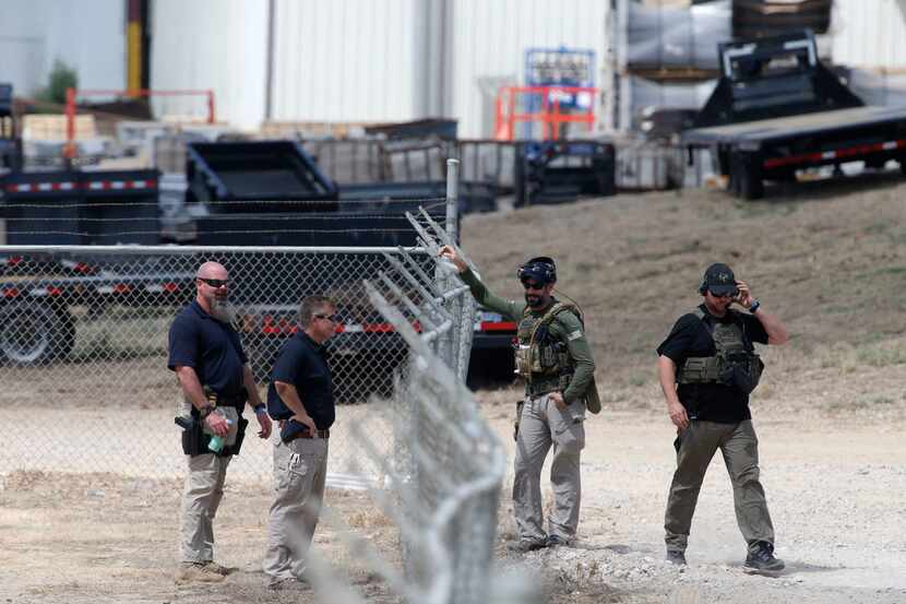 Agents from Immigration and Customs Enforcement and other departments met across the fence...