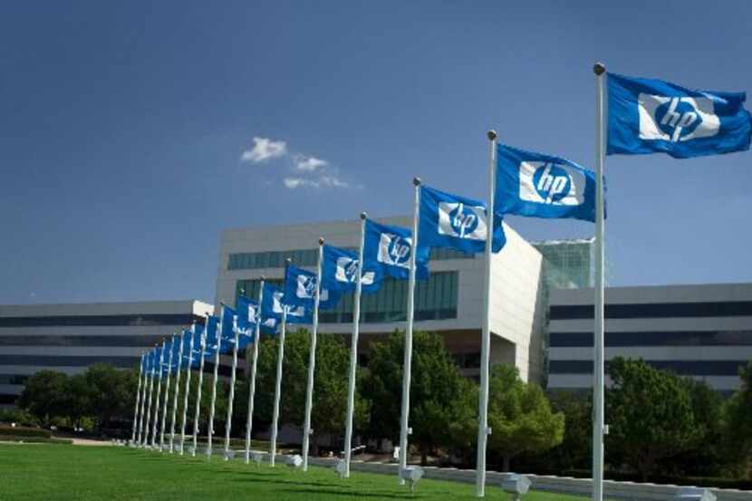 ORG XMIT: *S0427630773* 9/2009 -- HP flags fly over the former EDS headquarters in Plano in...