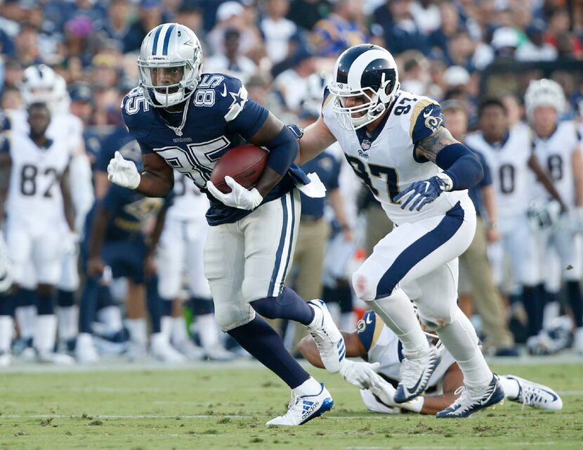 Dallas Cowboys wide receiver Noah Brown (85) runs up the field as he is chased by Los...