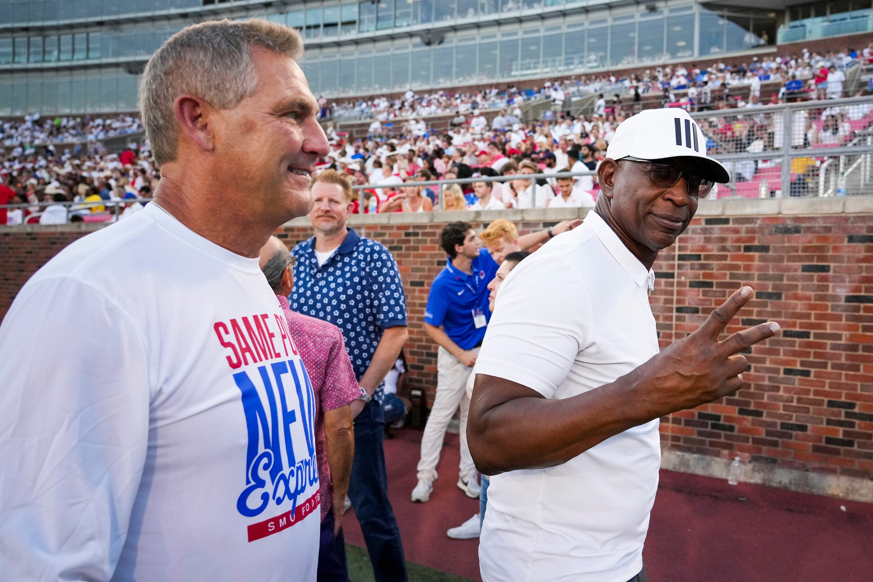 Members of the famed SMU Pony Express backfield, Eric Dickerson (right) and Craig James...