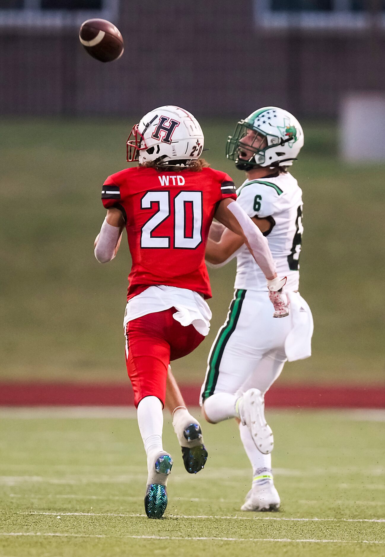 Southlake Carroll wide receiver Landon Samson (6) hauls in a 72-yard touchdown pass as...