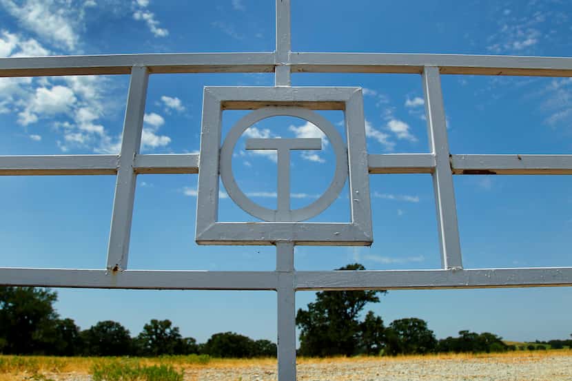 The Circle T Ranch brand is seen on a cattle gate in Westlake.