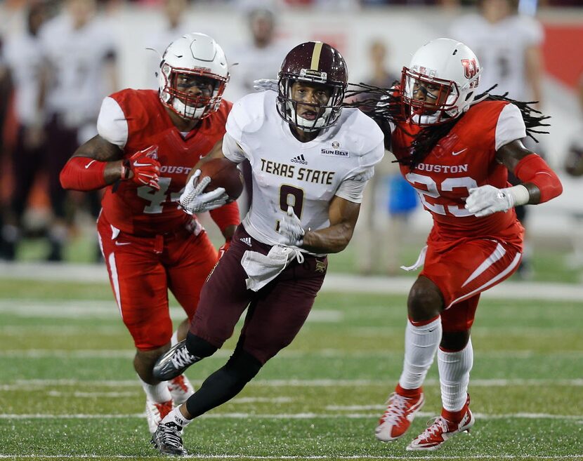 HOUSTON, TX - SEPTEMBER 26:  C.J. Best #9 of the Texas State Bobcats runs with the ball...