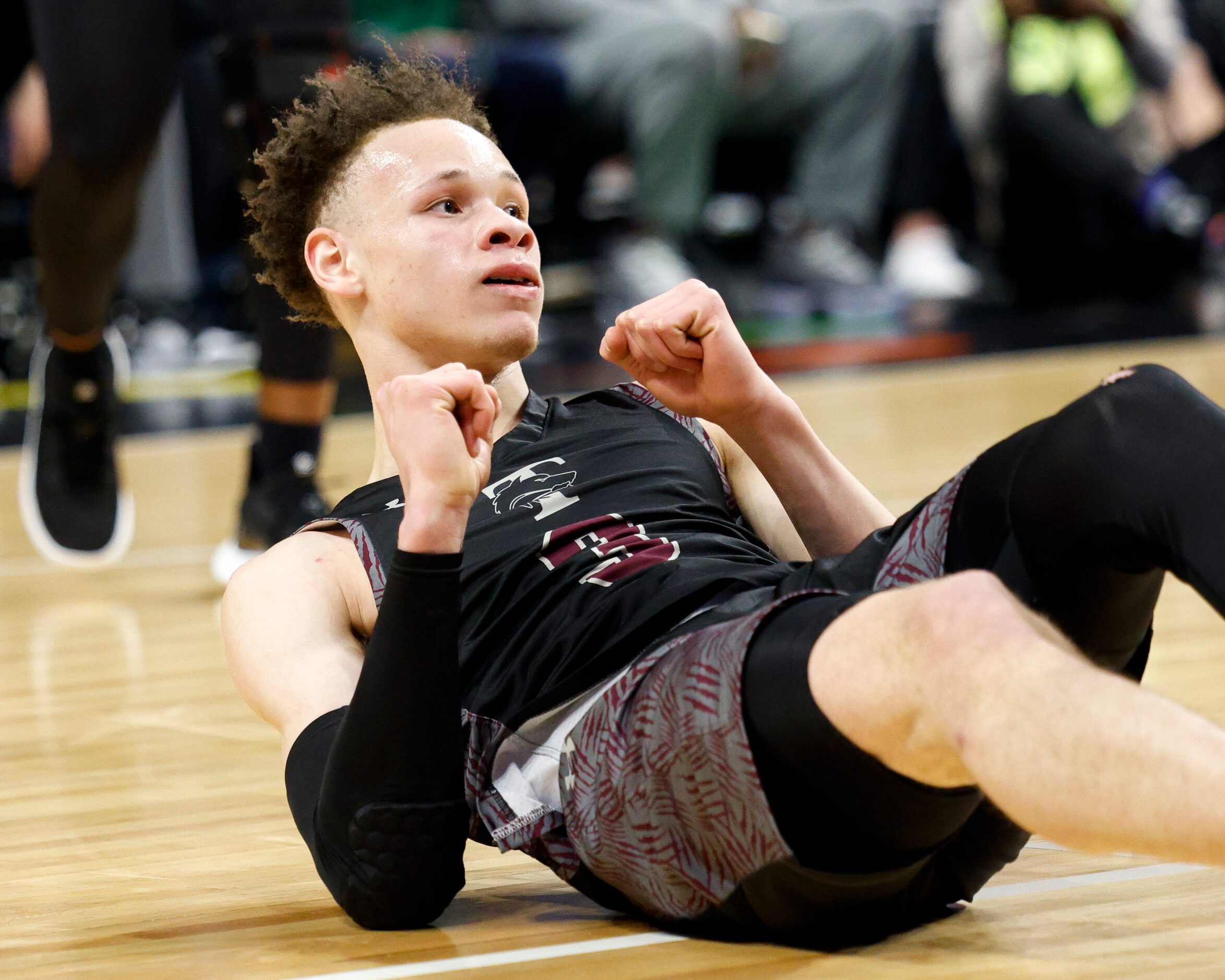 Mansfield Timberview guard Chendall Weaver (3) flexes after being fouled and making the...