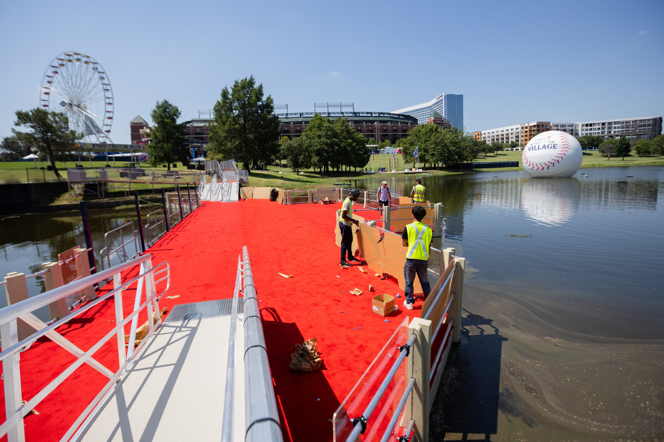 The Ferris wheel and floating baseball seen as finishing touches continue on the All-Star...