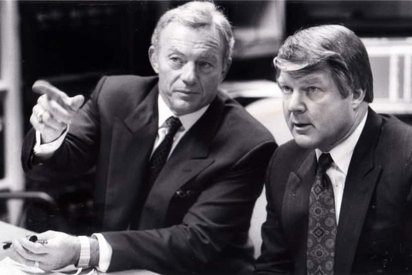April 21, 1991 - Dallas Cowboys' owner Jerry Jones (left) and coach Jimmy Johnson plot their...