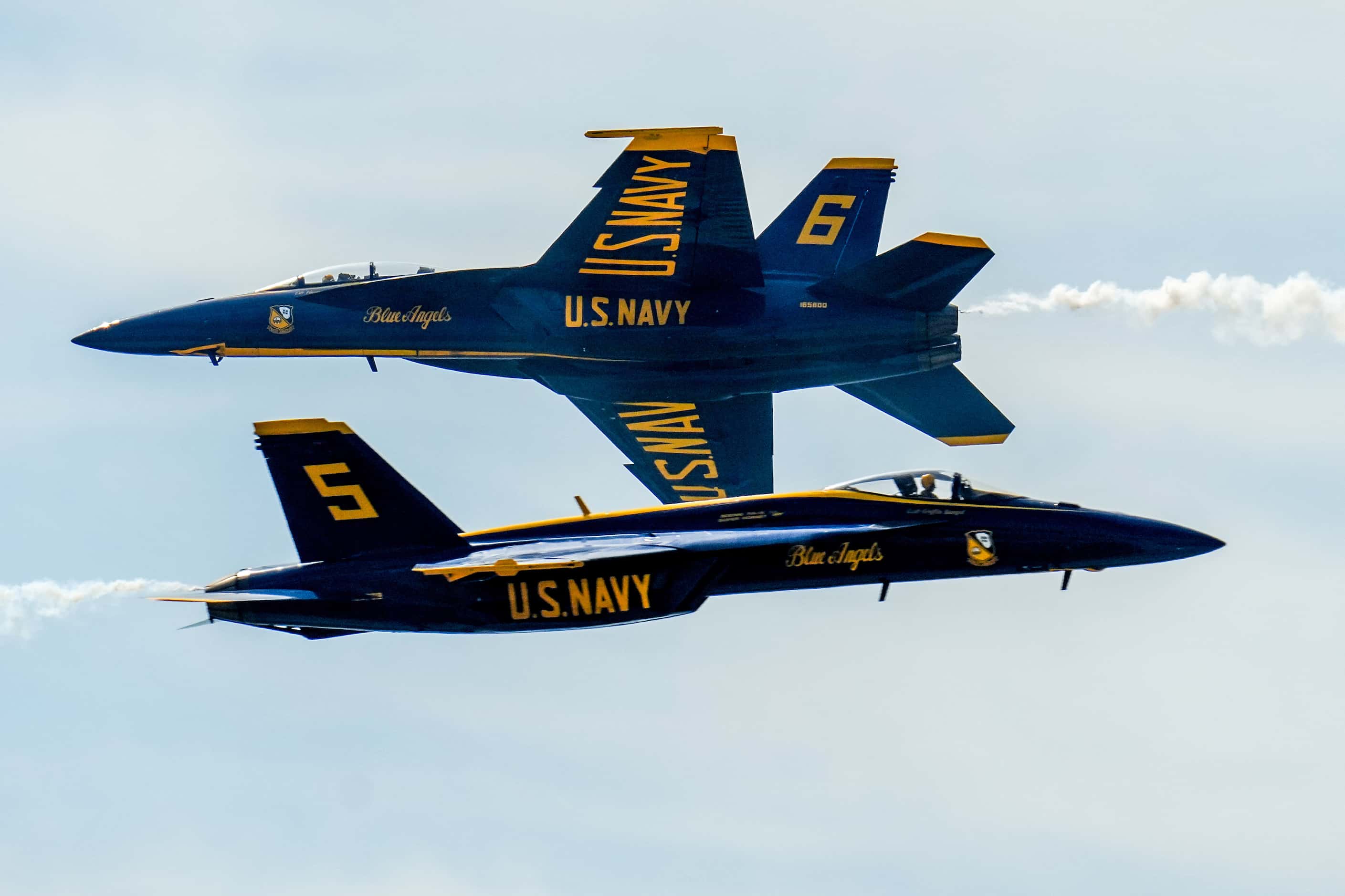 Cmdr. Thomas Zimmerman (top) and Lt. Cmdr. Griffin Stangel of the Blue Angels perform at the...