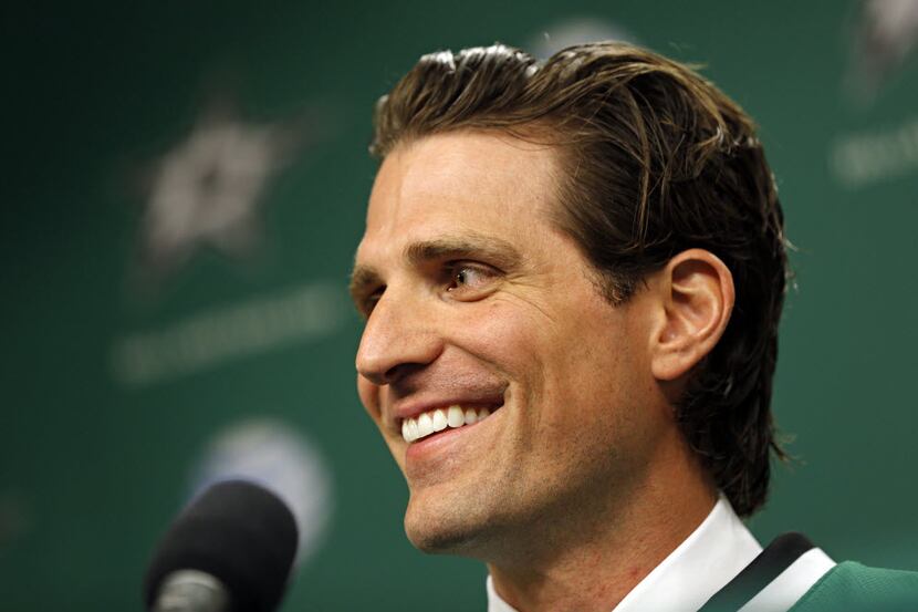 New Dallas Stars wing Patrick Sharp smiles as he speaks to media during a press conference...