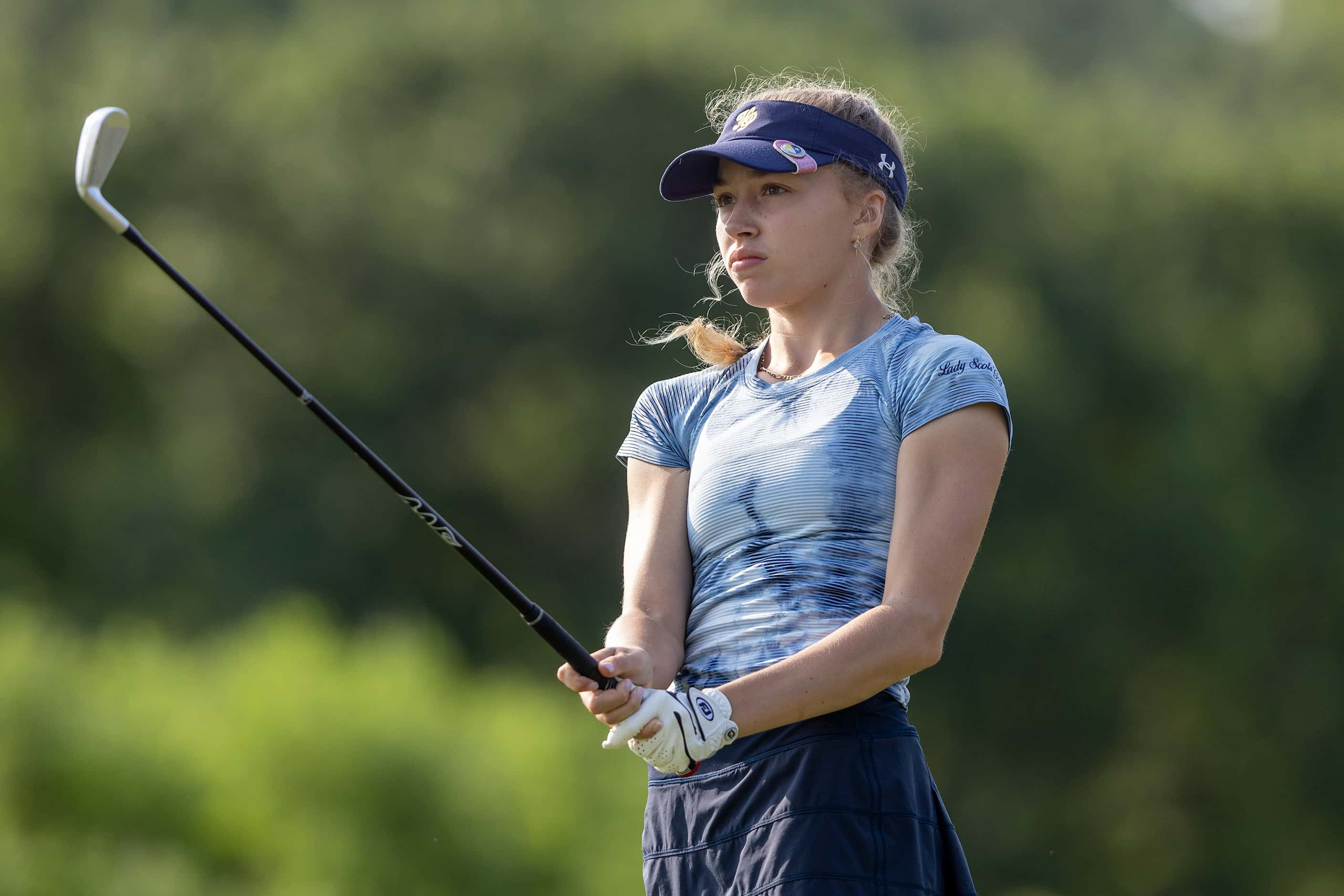 Highland Park’s Grace Heiss hits from the 3rd tee box during the 5A girls state golf...