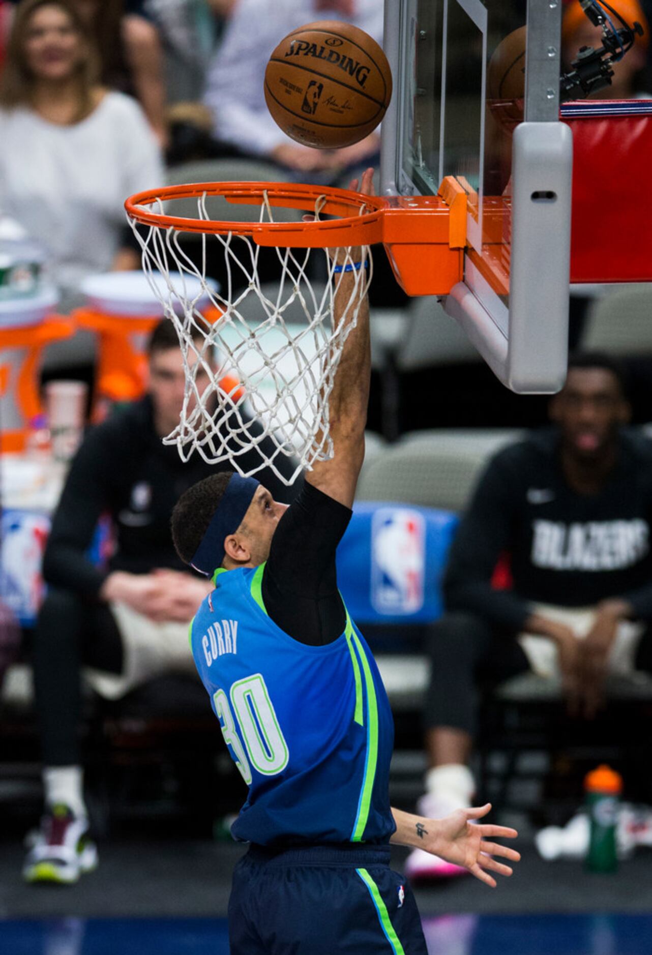 Dallas Mavericks guard Seth Curry (30) makes a basket un defended during the fourth quarter...