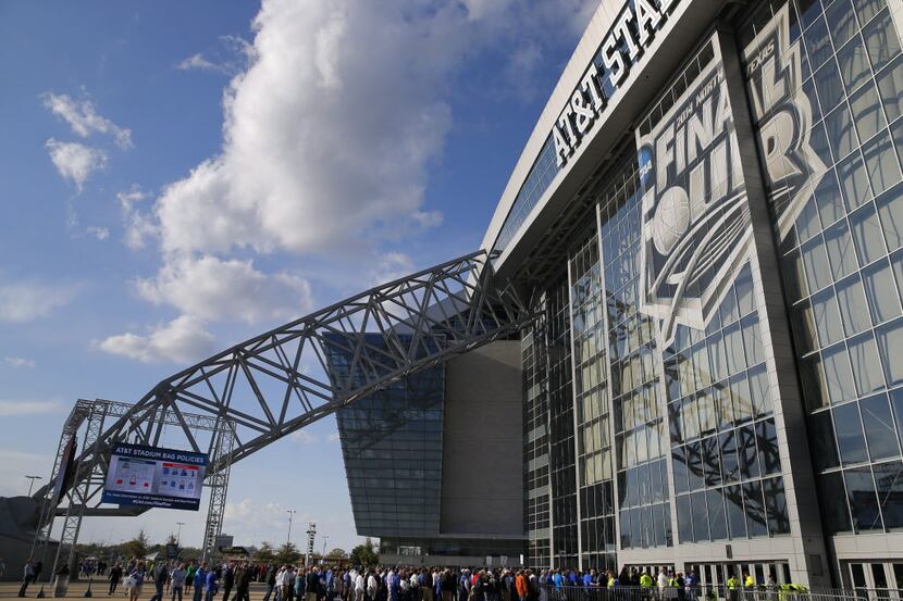 Basketball fans head to AT&T Stadium in Arlington for the NCAA National Basketball...