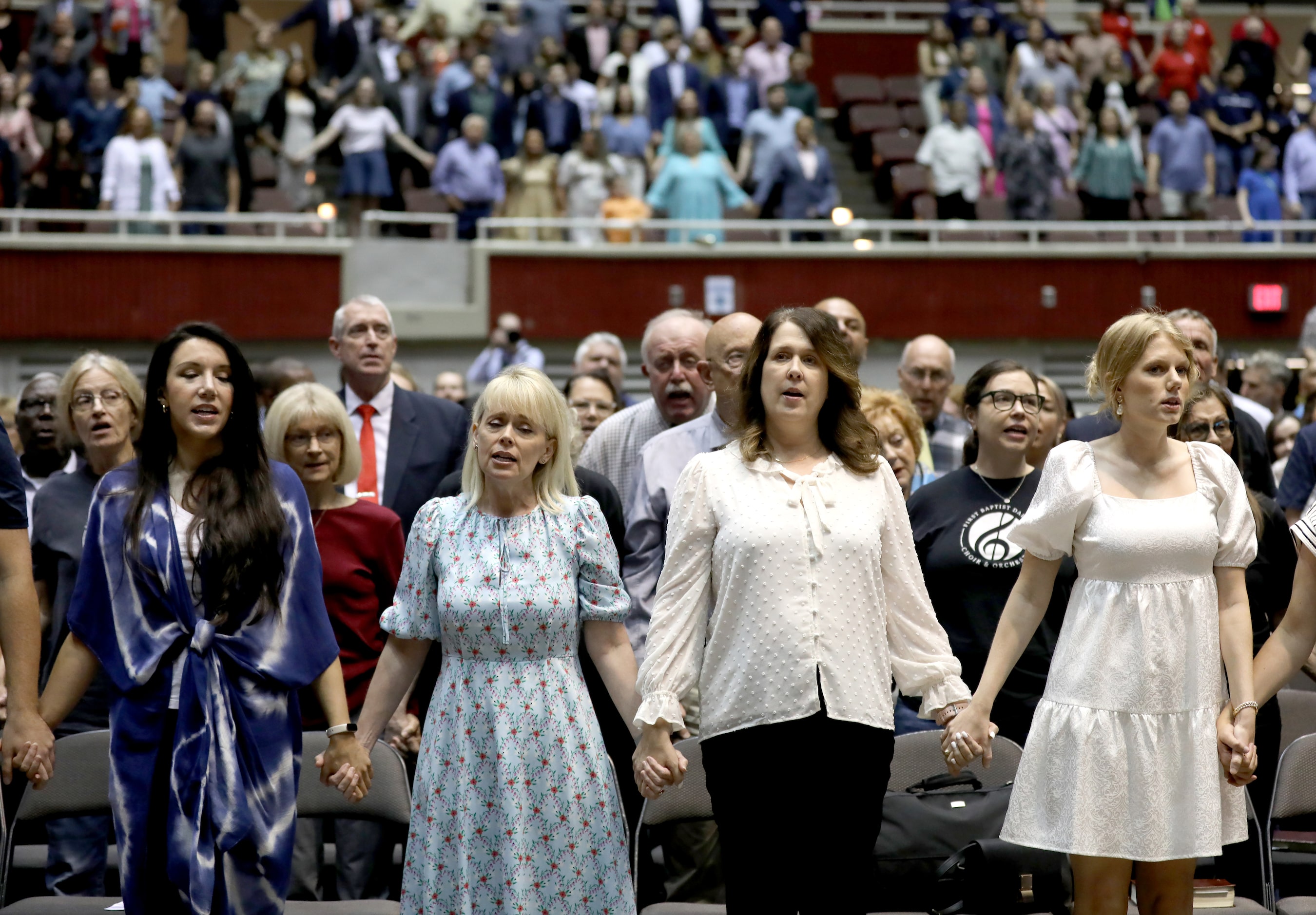 First Baptist Church members participate in Sunday service held at the Dallas Convention...