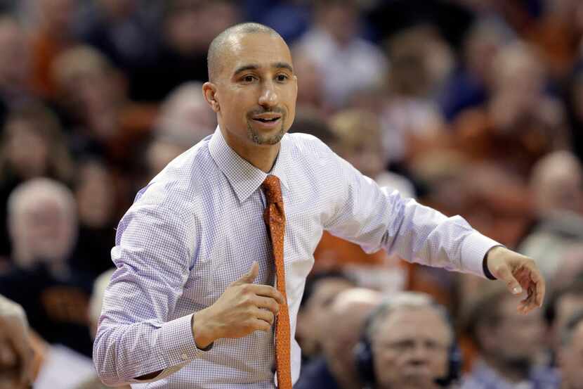 Texas head coach Shaka Smart watches his team during the second half of an NCAA college...