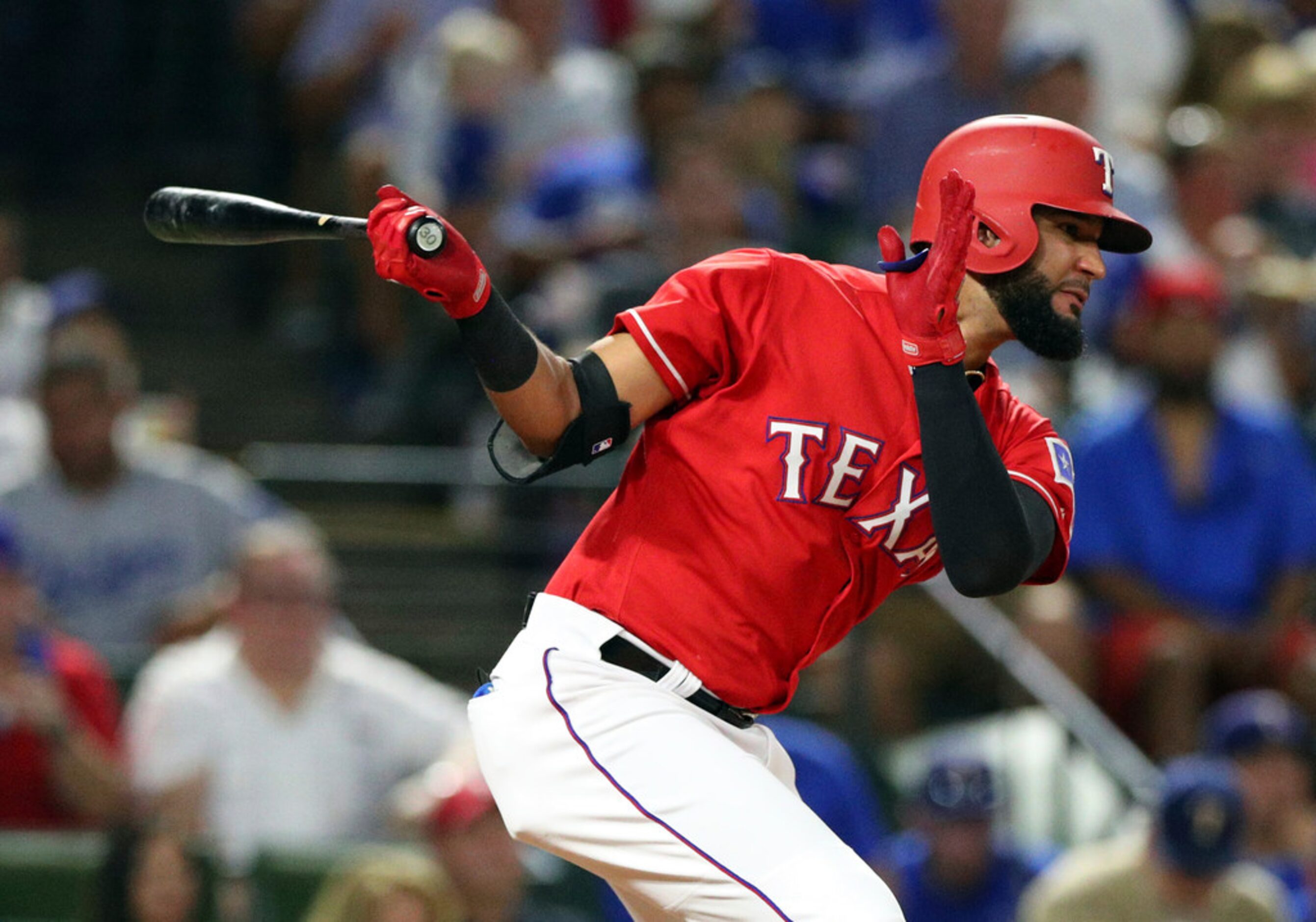 Texas Rangers right fielder Nomar Mazara (30) hits an RBI single against the Los Angeles...