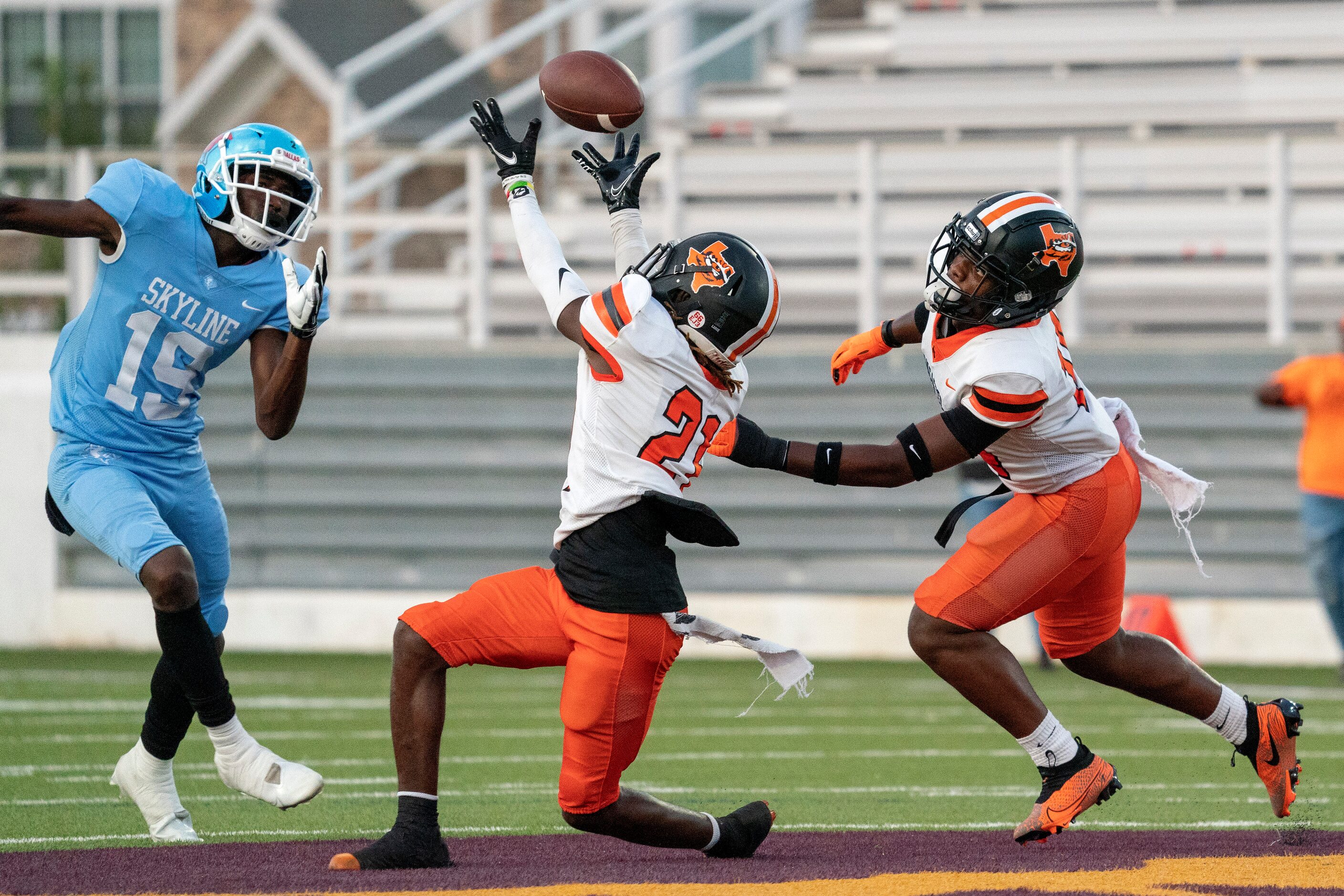 Lancaster defensive backs Toddrick Cobb (21) pulls in an interception in front of Skyline...