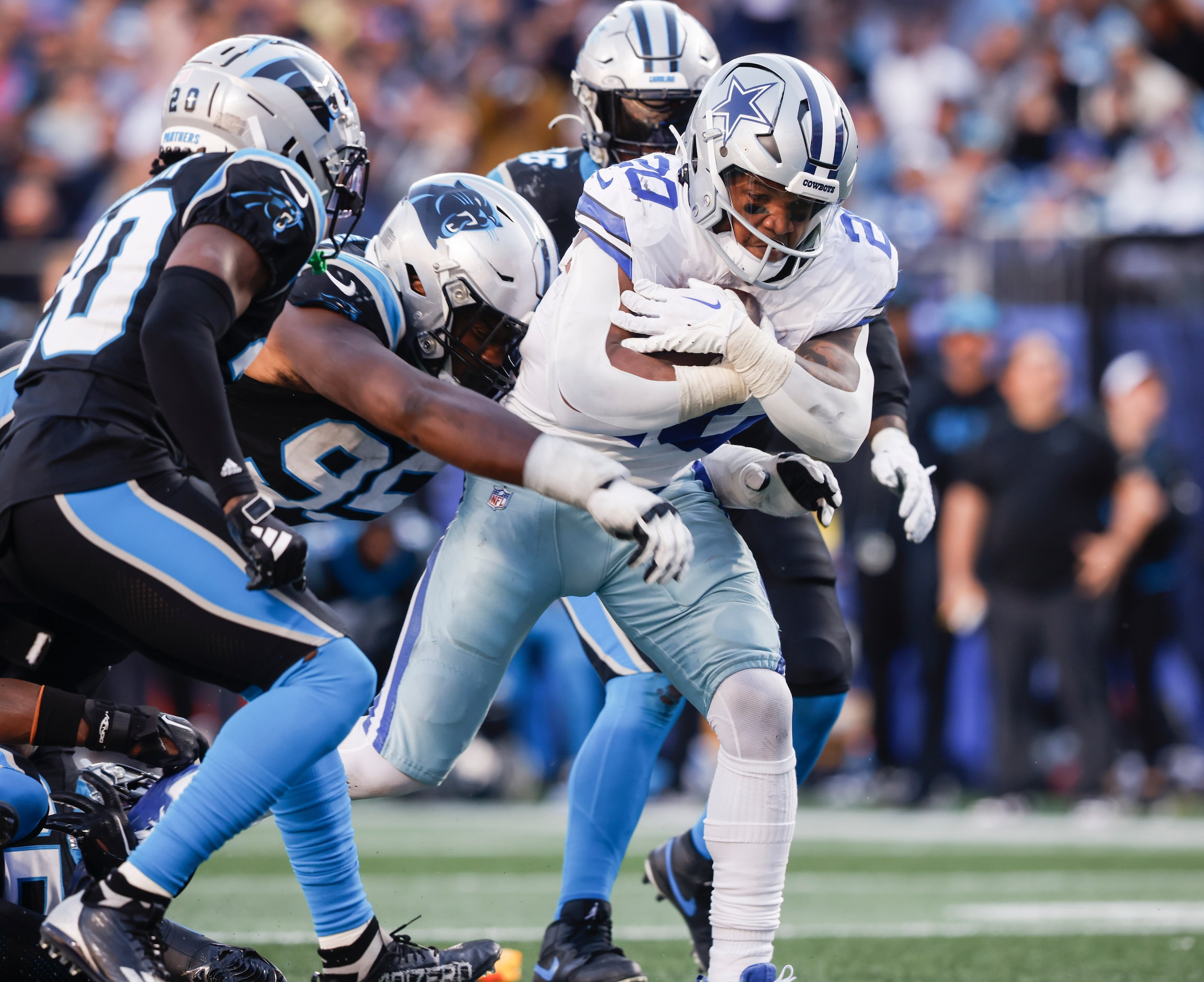 Dallas Cowboys running back Tony Pollard (20) runs up the middle for a touchdown during the...