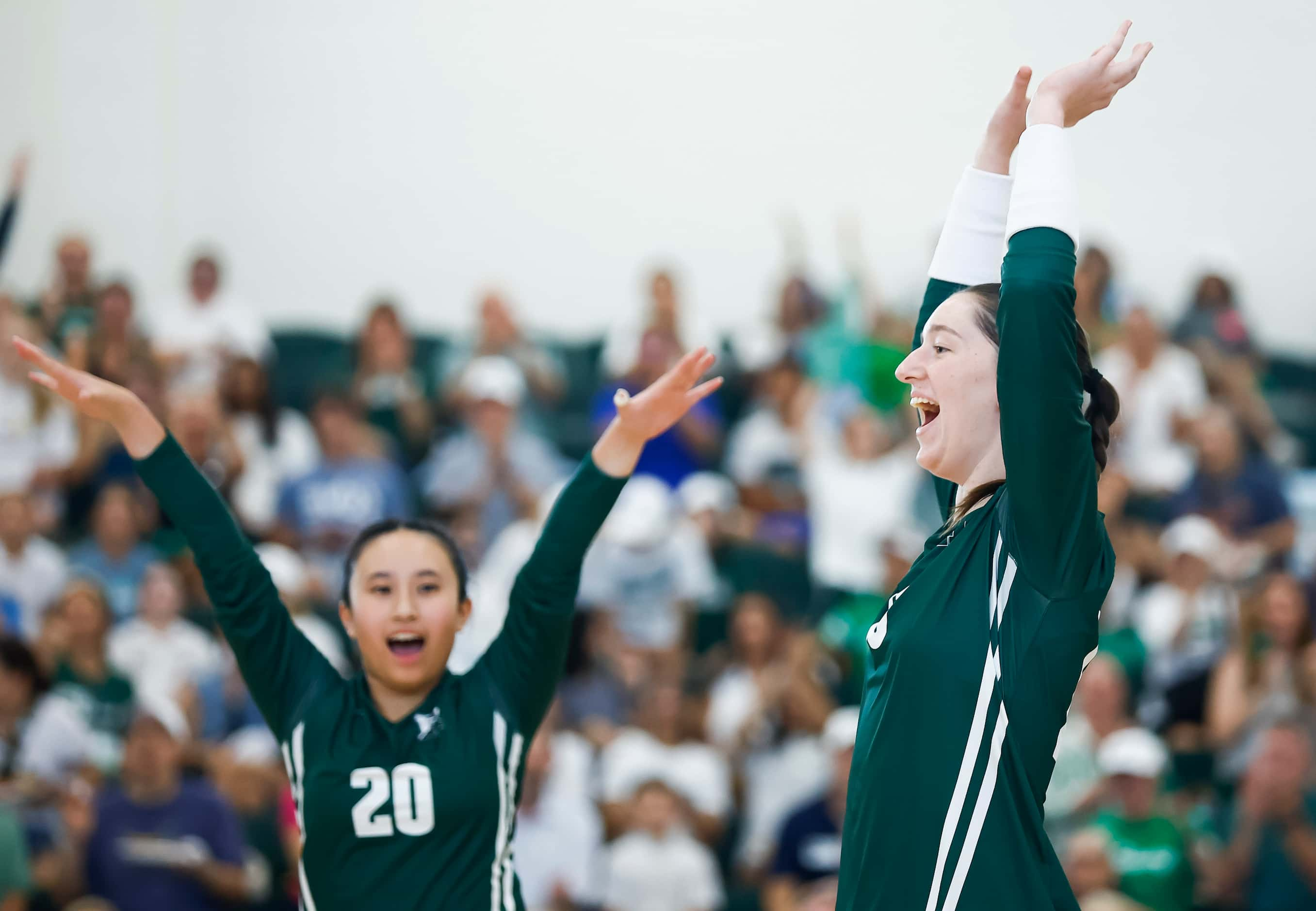 Hockaday junior middle blocker Olivia Wayne, right, and sophomore setter Ai-Vy Ho celebrate...