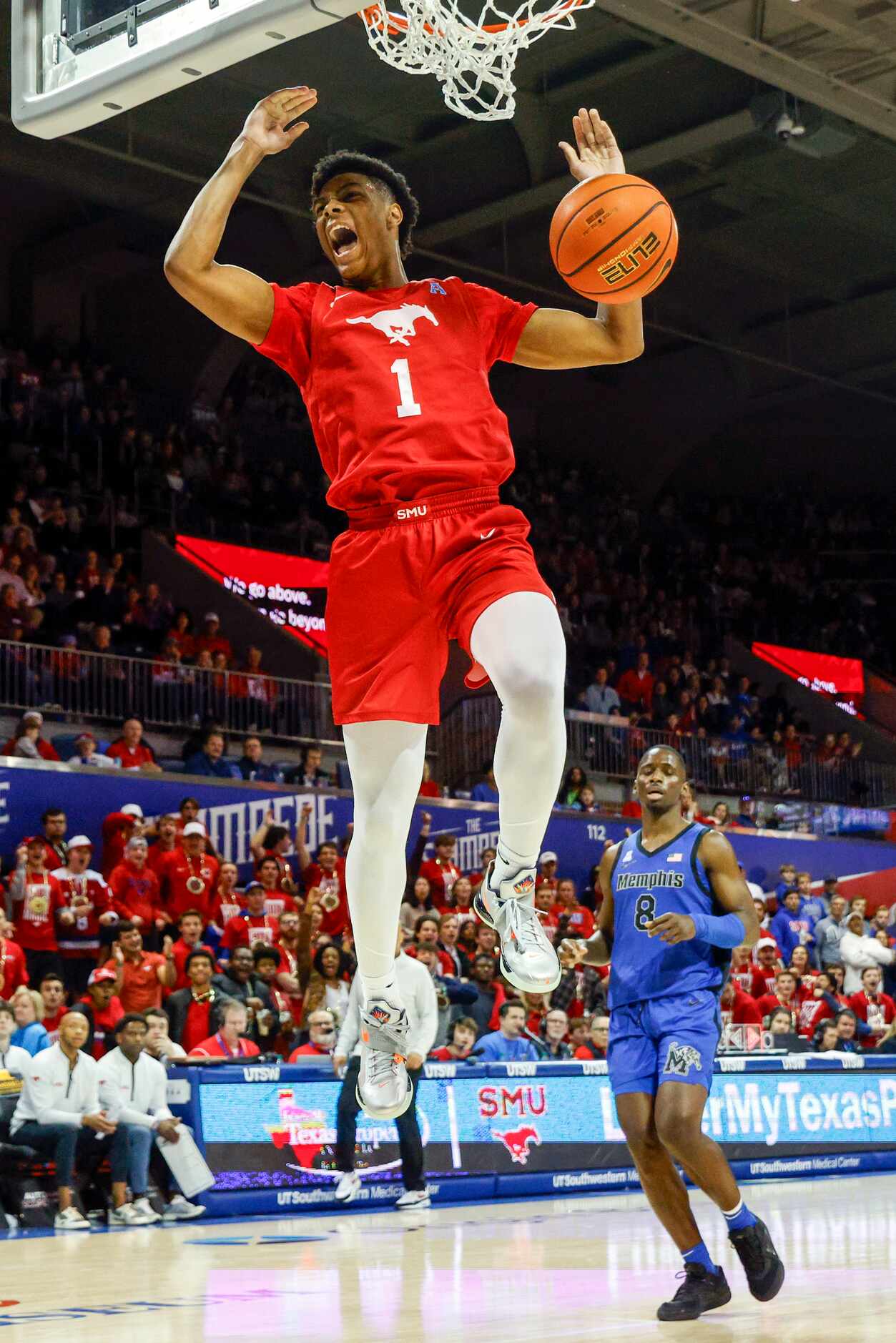 SMU guard Zhuric Phelps (1) dunks the ball during the second half of an NCAA basketball game...