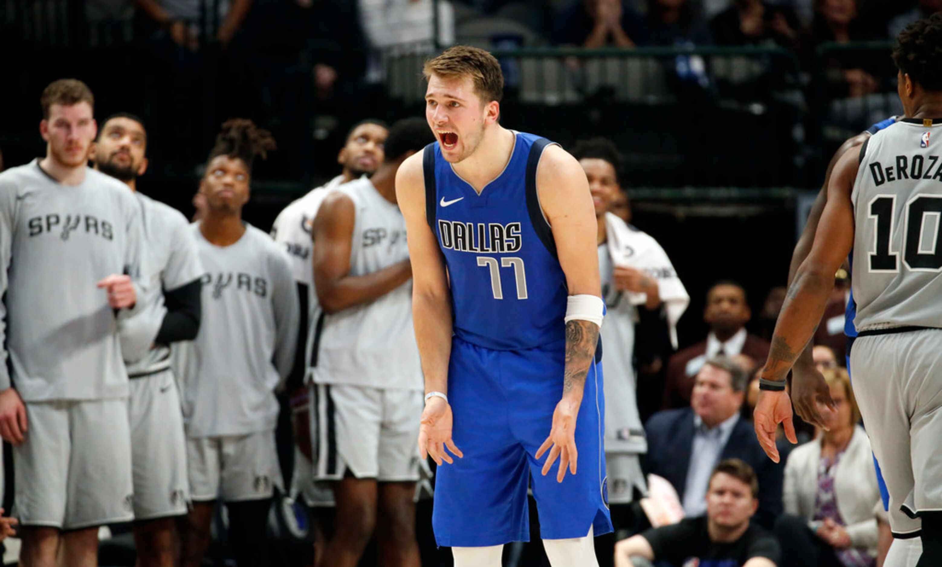 Dallas Mavericks forward Luka Doncic (77) reacts after he didn't get a fourth quarter...