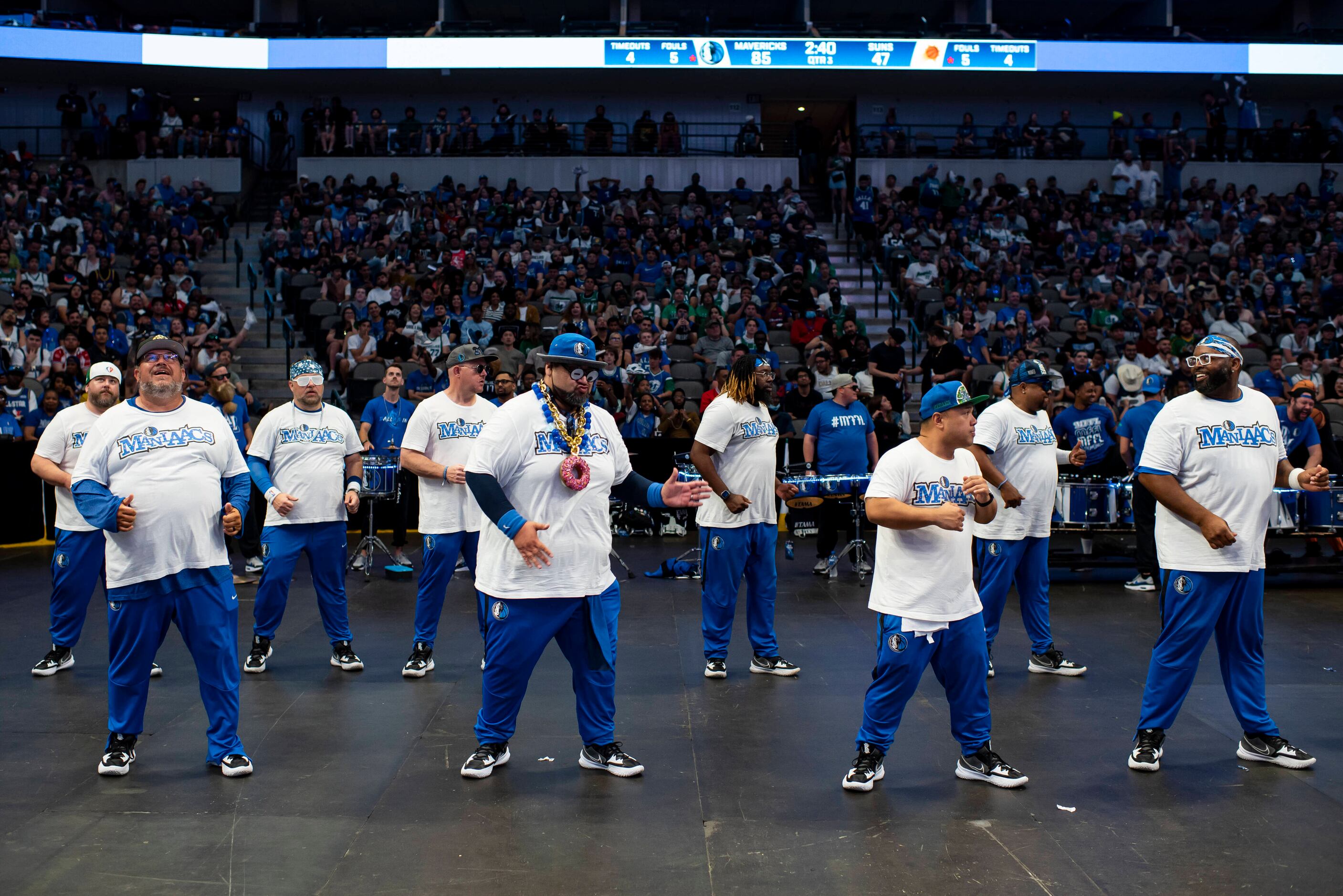 The Mavs ManiAACs dance during a timeout at the Dallas Mavericks official watch party for...