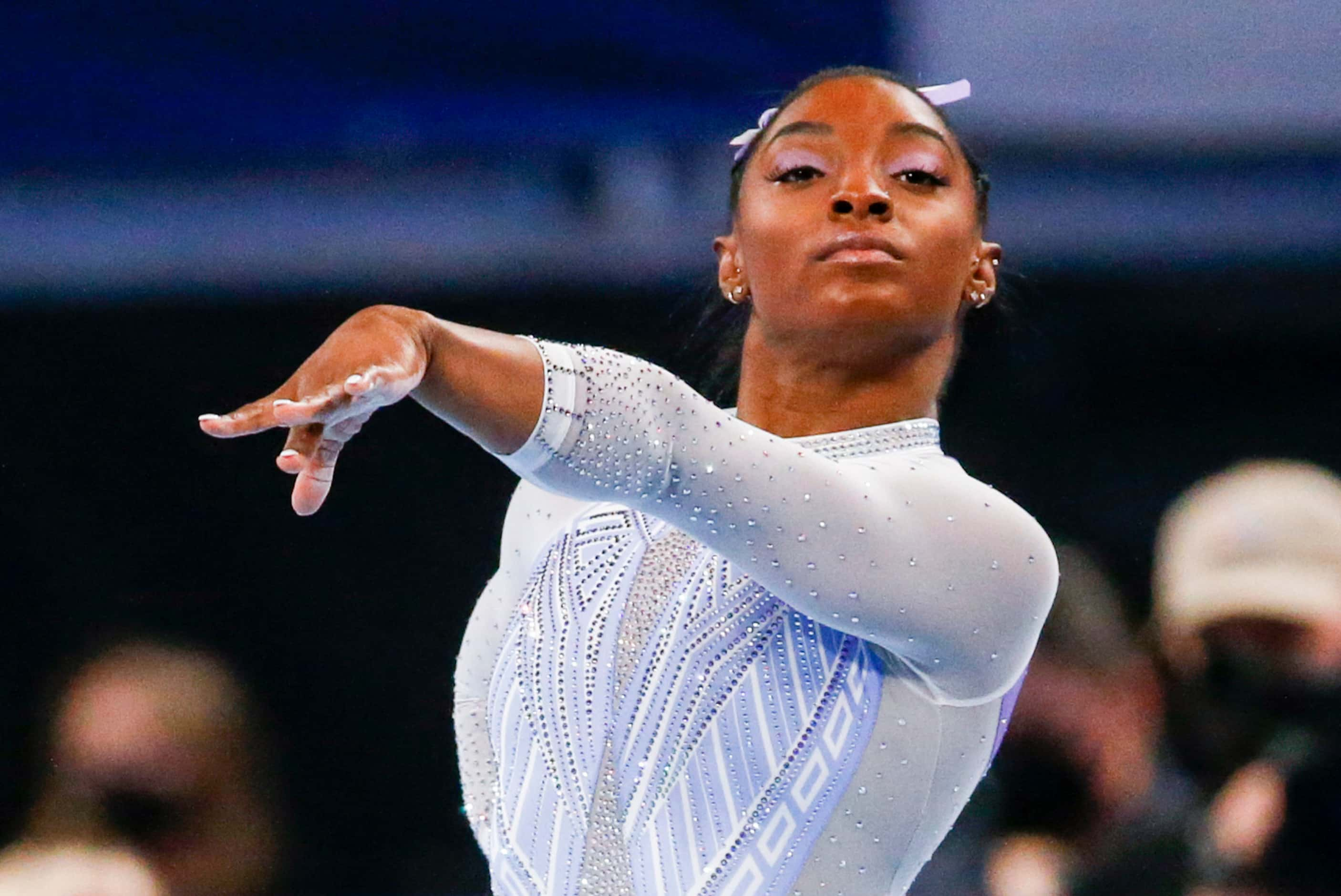 Simone Biles performs on the floor during day 1 of the senior women's US gymnastics...